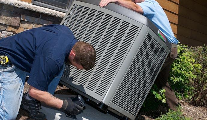 Person installing heating unit